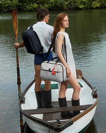 Collection of outdoor waterfront scenes showing people engaged in activities near or on water, including boating and lakeside recreation.